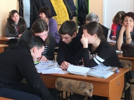Students at the other school, totally absorbed in the group work.